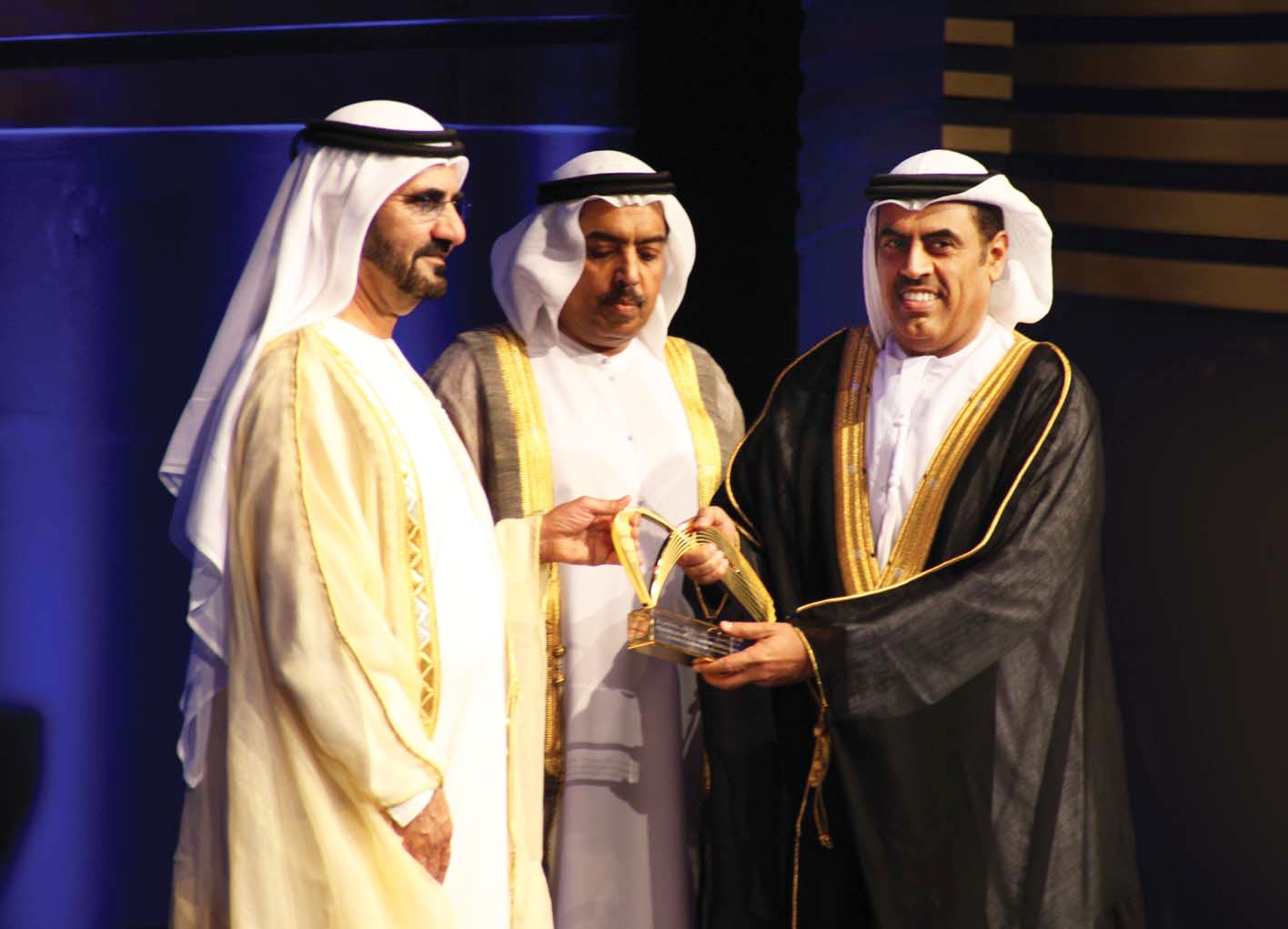 Receiving an award from HH Sheikh Mohammed bin Rashid Al Maktoum